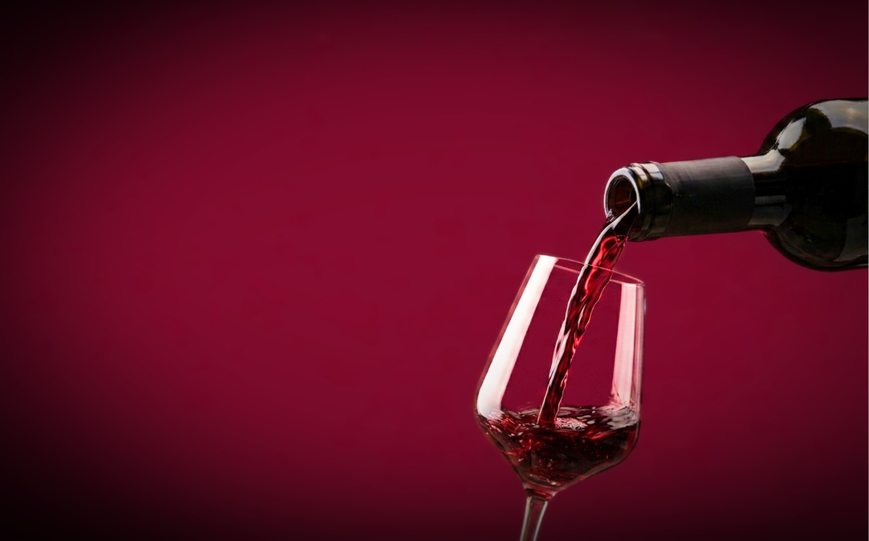 Profile Wine Group — red wine pouring into a glass